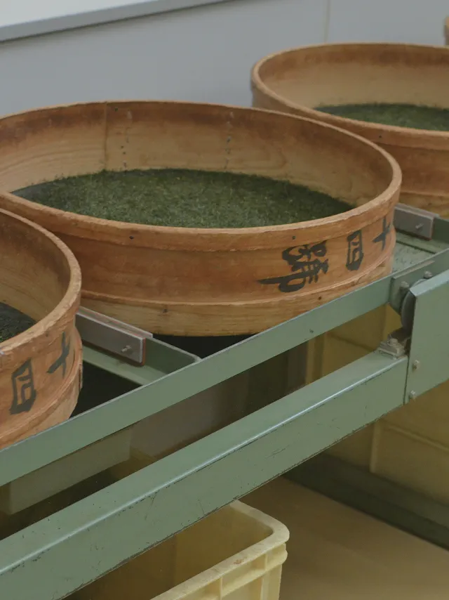 Finished tea sifted through traditional wooden sieves at the Sasaki Seicha facility.